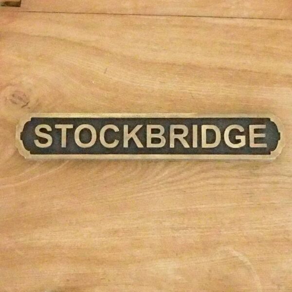 stockbridge black & gold sign